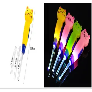 Detailed view of LED light-up cartoon animal ear pick with glowing tips and size dimensions.