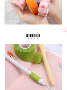 Close-up detail of cute self-adhesive finger wrap tapes, flexible protection for writing.