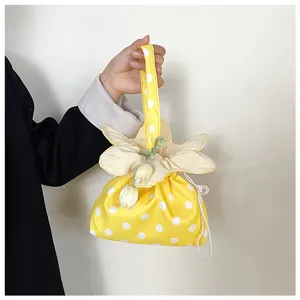 Stile coreano carina borsa a mano in tela a pois gialli con coulisse pochette portatile.