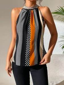 Stunning halter neck sleeveless top featuring chic polka dot and vertical stripe patchwork.