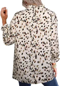 Back detail of stylish long sleeve abstract printed blouse featuring high ruffle collar design.