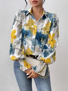 Women elegant long sleeve printed blouse lapel puff sleeve casual shirt closeup view.
