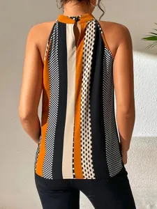 Back view detail of women geometric print halter neck sleeveless top showing pattern.