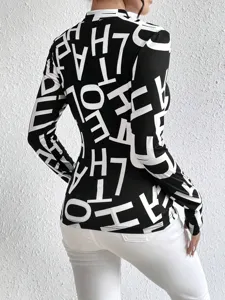 Back view detail of the fashionable black and white letter print long sleeve slim top.