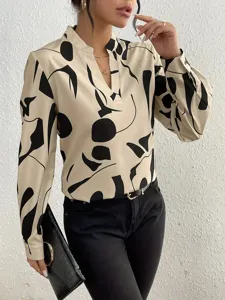 Detailed close-up of women chic abstract printed V-neck long sleeve blouse in beige.