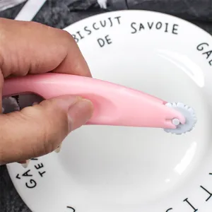 Fondant roller cutter and embossing tool set for cake decorating, baking and sugar craft.
