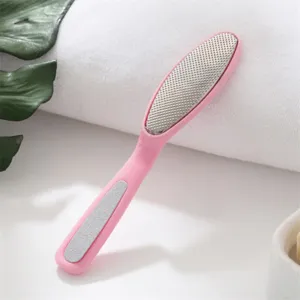 Dual-use stainless steel foot file and dead skin remover with pink handle in front view.