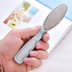 Dual-sided stainless steel foot file and callous remover with ergonomic handle for smooth skin.