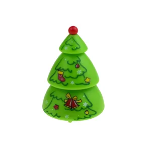 Christmas tree pull back toy car detail view, green festive vehicle with red top ball.