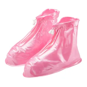 Pink waterproof rain shoe covers for outdoor hiking, durable PVC overshoes with zipper.