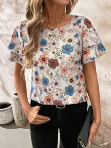 Detailed view of the casual floral print short sleeve blouse with layered ruffle sleeves.