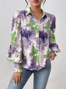 Close up view of women long sleeve floral print blouse with lapel collar and puff sleeves.