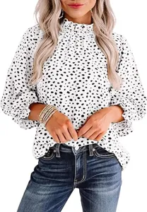 Close up detail of women long sleeve abstract dot print top crew neck casual fashion blouse.
