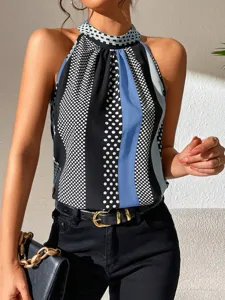 Stylish summer polka dot halter top detail, featuring chic sleeveless print and neck.