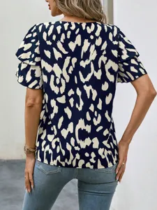 Women casual loose abstract print short sleeve top back view detail showing ruffles