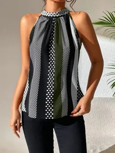 Detailed close-up of the stylish halter neck sleeveless top featuring chic polka dot and stripe patterns.