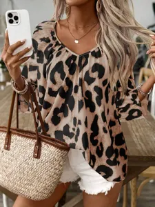 Leopard print V-neck women's blouse detail view, stylish casual commuting apparel.