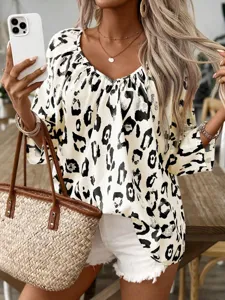 Detailed shot of women's fashion casual leopard print long sleeve V-neck blouse top