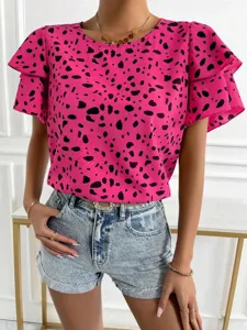Pink dot print short sleeve blouse top paired with denim shorts, stylish casual summer wear.