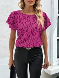 Stylish women's short-sleeve top featuring vibrant pink fabric and chic abstract prints.
