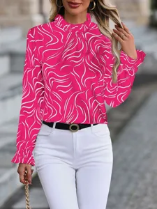 Close-up detail of the stylish fuchsia pink long sleeve blouse with elegant abstract white prints.