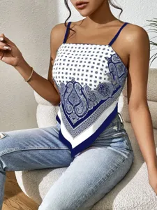 Blue and white paisley print camisole top detail showcasing unique asymmetric hem style.