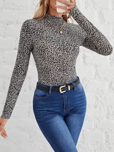 Chic leopard print long sleeve mock neck top detail, stylish slim fit autumn winter fashion.