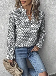 Women's chic geometric print long sleeve blouse with ruffled V-neck and elegant lantern sleeves.