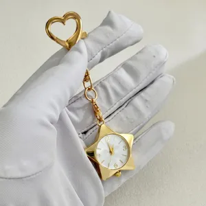 Goldener Stern Taschenuhr Schlüsselanhänger mit Herzverschluss, Retro Tasche Quarz Uhr