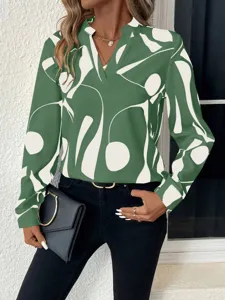 Detail view of the elegant green abstract print V-neck long sleeve blouse for women fashion.