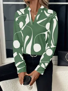 Green abstract print V-neck long sleeve blouse shirt detail view, casual relaxed fit fashion top.