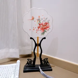 Traditional Chinese embroidered hand fan with floral peony pattern for Hanfu costume.