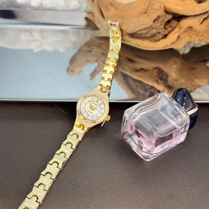 Delicate small dial quartz watch with slim linked bracelet for women, classic minimalist design.
