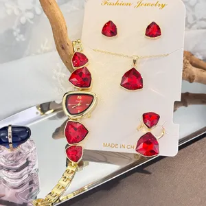 Red crystal jewelry set including watch necklace earrings ring four piece fashion gift.