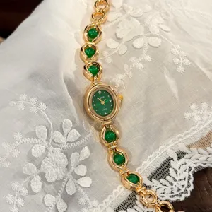 Orologio al quarzo da donna vintage con quadrante verde e bracciale a catena elegante