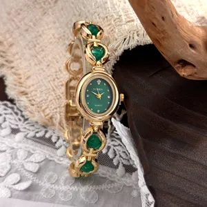 Orologio da donna vintage con quadrante verde ovale e cinturino con perline.