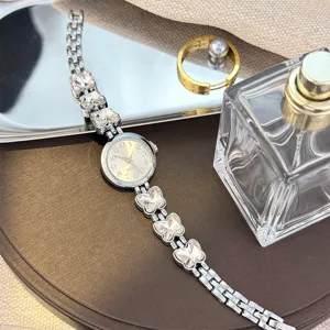 Silber Strass Schmetterling Kleeblatt Quarz Damenuhr, stilvolle Armbanduhr Schmuck Accessoire.