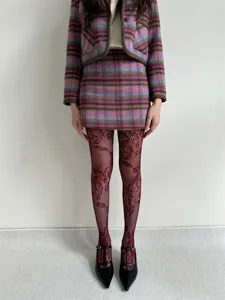 Vintage plaid jacket skirt set with wine red lace fishnet tights and black Mary Jane flats.