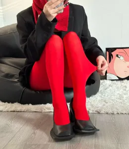 Vibrant red velvet pantyhose, candy color opaque tights for women, stretchy detail.