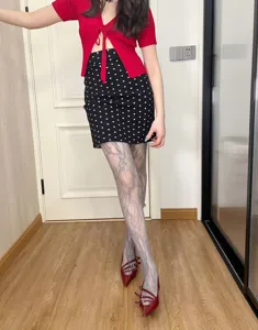 Detailed view of floral pattern lace tights featuring elegant mesh design for women.