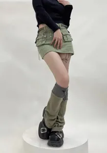 Detailed view of women's functional colorblock drawstring leg warmers for autumn winter.