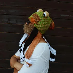 Handcrafted crochet octopus hat featuring funny long tentacles and cozy wool knit for parties.