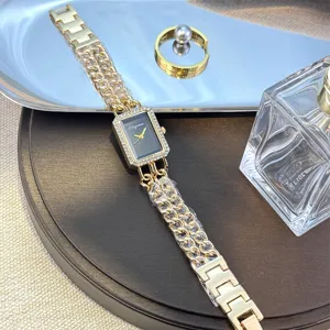Luxus goldene rechteckige Quarzuhr für Damen mit Strass und doppeltem Kettenarmband.