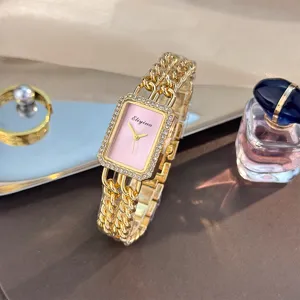Luxus rechteckige pinke Strass Damen Quarzuhr mit goldenem doppelten Kettenarmband.