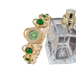 Luxury gold women quartz watch with green stone rhinestones stylish bracelet design