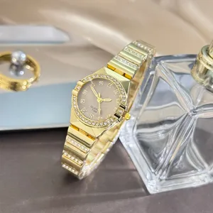 Elegant gold quartz rhinestone women watch with dazzling crystals and sleek luxury bracelet design