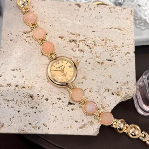 Vintage Damen Gold Quarzarmbanduhr mit rosa runden Steinperlen Armband elegante Uhr.
