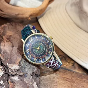 Boho bohemian style quartz watch with colorful canvas strap and mandala dial for women.
