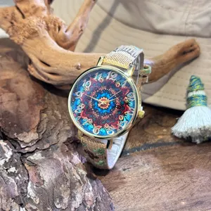 Bohemian style womens quartz watch with colorful mandala dial and woven fabric strap for casual wear.