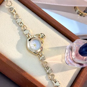 Gold hollow heart chain quartz watch with cute pendant exquisite fashion jewelry timepiece